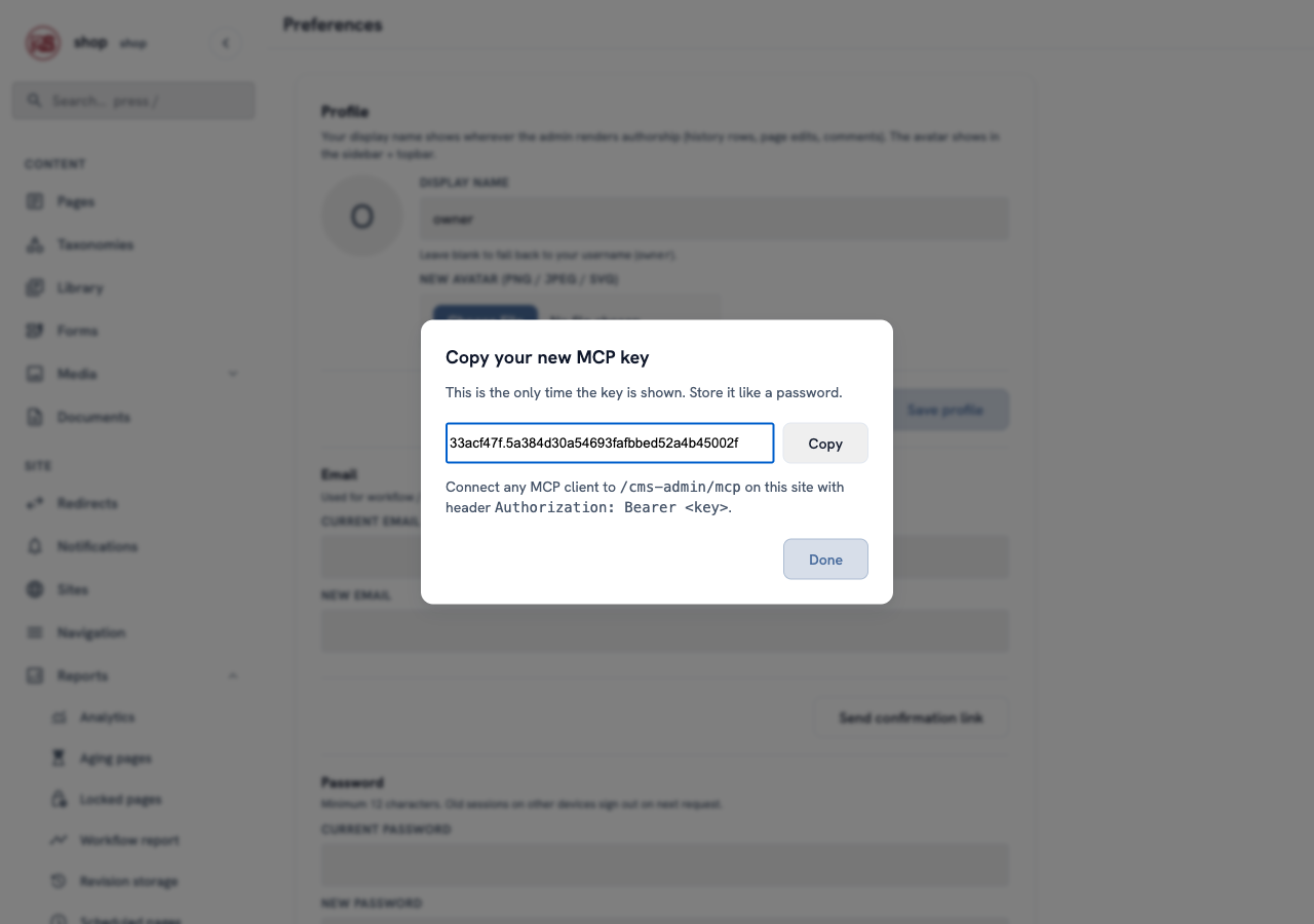 The window "Copy your new MCP key" with the key, a Copy button, and the address /cms-admin/mcp