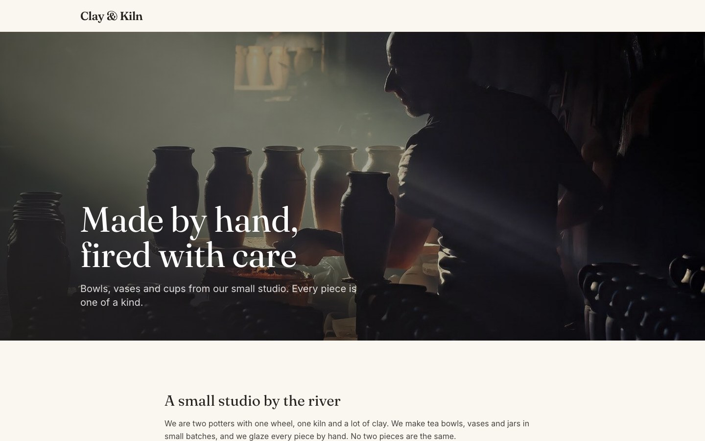 The finished home page: a potter in a dark studio, with the heading "Made by hand, fired with care"