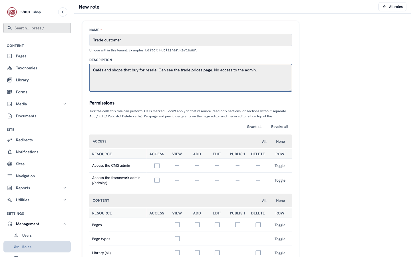 The New role form: name Trade customer, a description, and the permission table with nothing ticked